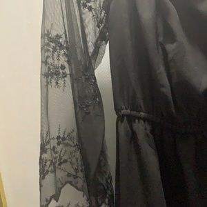 Black dress, long lace sleeve, dress is up to your knees